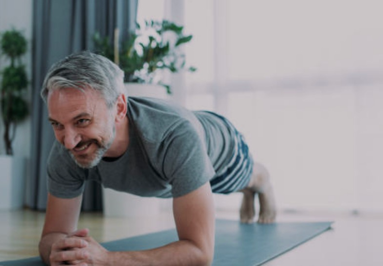man doing plank - healthy lifestyle